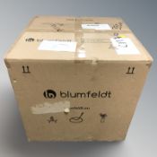 A Blumfeldt chiminea/barbecue in box.