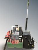 An electric hedge trimmer, Black & Decker drill, socket set, a small Bush TV, G Tech vacuum cleaner,