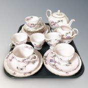 Twenty two pieces of Tuscan pink floral decorated tea china.