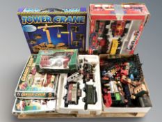 A group of model train sets, remote control tower crane.
