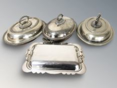 A group of EPNS lidded entree dishes.
