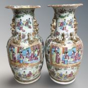A pair of 19th century Cantonese famille rose porcelain baluster vases,