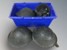 A group of metal helmets