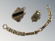 An early 20th century Lady's wrist watch with 9ct gold back case, on rolled gold bracelet,