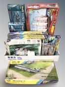A group of scale modelling kits including Airfix, Revel, etc.
