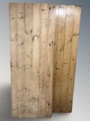 Two pine topped folding trestle tables,