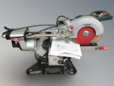 A Metabo mitre saw, with instructions.