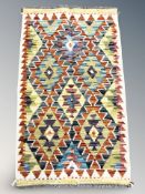 A Chobi Kilim rug, 102 cm x 63 cm.