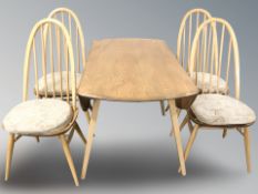 An Ercol light elm and beech drop leaf dining table, width 113 cm,