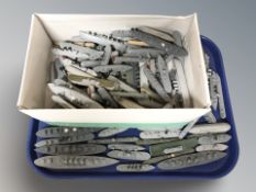 A quantity of miniature wooden model boats.