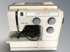 A Riccar Diamond 8 15 electric sewing machine, with lead and pedal.