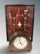An oak Art Deco mantel clock signed Northern Goldsmiths, height 21 cm,