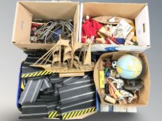 A group of model boats, railway track and rolling stock, globe, Scalextric track, etc.