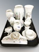 Twelve items of Aynsley porcelain including vases, mantel time piece,