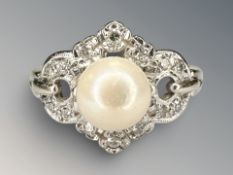 An 18ct white gold pearl and diamond ring,