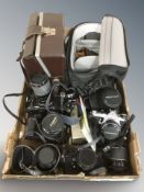 Cameras including Pentax, Canon EOS1000F, a Canon AE-1, various lenses, two camera bags, etc.