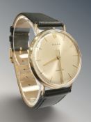 A gent's 9ct Rolex Precision centre seconds wristwatch, silver dial with baton numerals,