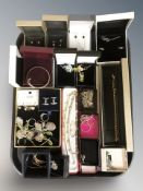 A collection of costume jewellery including several pairs of earrings,