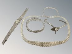 A group of silver jewellery including watches and bangle set with pearl