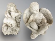Two concrete cherubs ornaments,
