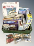 A group of scale modelling kits including Airfix, Revel, etc.