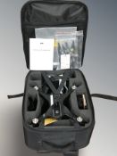 A DJI Phantom II remote control drone in carry bag with instrucitons and accessories