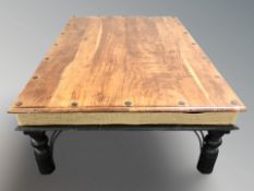 A sheesham wood rectangular coffee table, 134 cm x 90 cm.