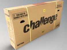 A Challenge Hybrid lady's bike, boxed in new condition.