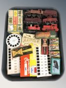 A quantity of viewing slides, die cast locomotives, model railway accessories, etc.