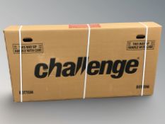 A Challenge Hybrid lady's bike, boxed in new condition.