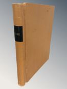 A large accounts ledger, partially filled,