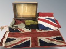 A group of vintage flags, cigar box, etc.