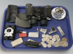 A pair of Tasco 6x-18x35 binoculars, pair of Gelert 8x21 binoculars, together with several lighters,
