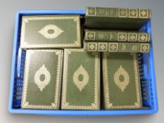 A quantity of modern Dickens volumes.