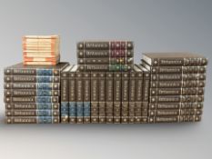 A collection of Encyclopedia Britannica volumes and several Penguin books