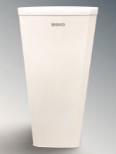 A Beko upright freezer.