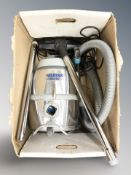 A Nilfisk vacuum cleaner.