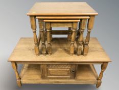 A reproduction oak two-tier low table,