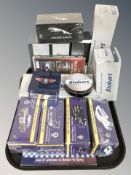 A group of boxed Atlas Editions die cast models including police vans, Eddie Stobart vehicles,