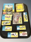 A group of reproduction Corgi die cast model vehicles in boxes including Special Agent 007 James