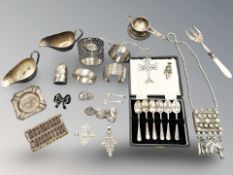 A quantity of silver/silver-plated and white metal items, silver cat brooch,