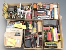 A quantity of die cast rolling stock, model railway buildings and components including Tri-Ang, etc.