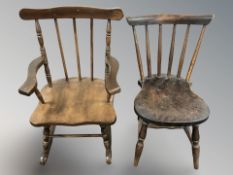 A child's rocking chair and a similar spindle back chair, height 60 cm.
