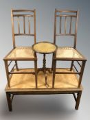 A reproduction mahogany coffee table with tooled leather top,