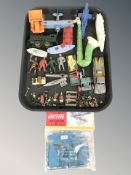 A quantity of die cast metal and plastic models, vehicles, figurines, etc.