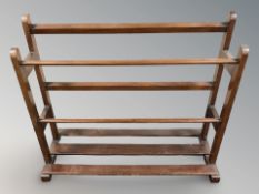 A reproduction umbrella stand, width 80 cm.