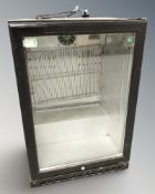 A commercial under-bench glass door refrigeration cabinet,