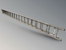 An aluminium extension ladder and further step ladders (4)