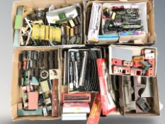 A quantity of die cast locomotives and rolling stock, track, Tri-Ang buildings.