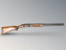 A Beretta S 686 Essential 12 bore over-under ejector shotgun, with signed black lock,